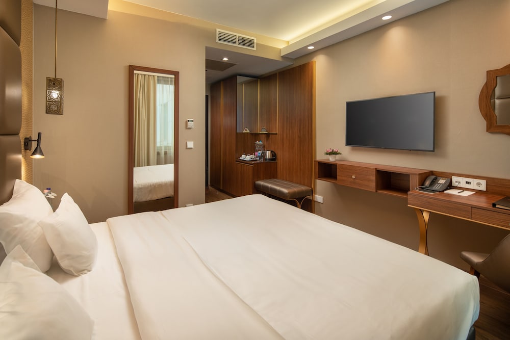 Habitación estándar con 1 cama doble o 2 individuales del hotel Continental Budapest. Foto 5