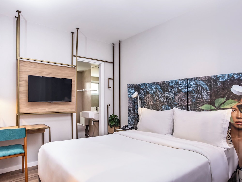 Habitación ejecutiva, 1 cama doble, vistas parciales al mar del hotel Mercure Rio Boutique Copacabana. Foto 1