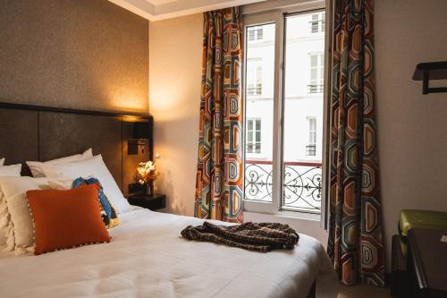 Doble Confort del hotel La Maison Montparnasse. Foto 6