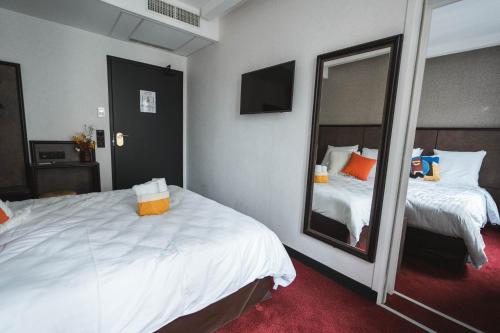 Doble Confort del hotel La Maison Montparnasse. Foto 8