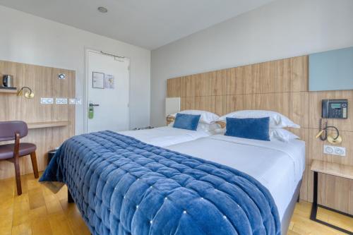 Habitación Twin Confort del hotel De Bellevue Gare du Nord. Foto 7