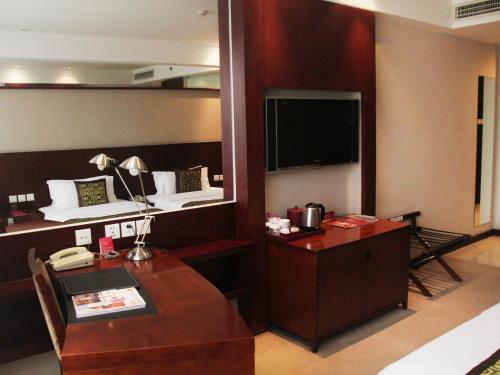 Superior twin bed room del hotel Mercure Wanshang Beijing