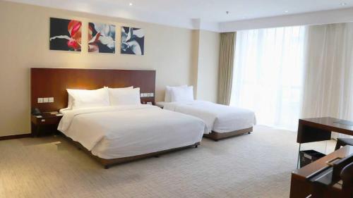 Habitación Familiar del hotel Mercure Wanshang Beijing