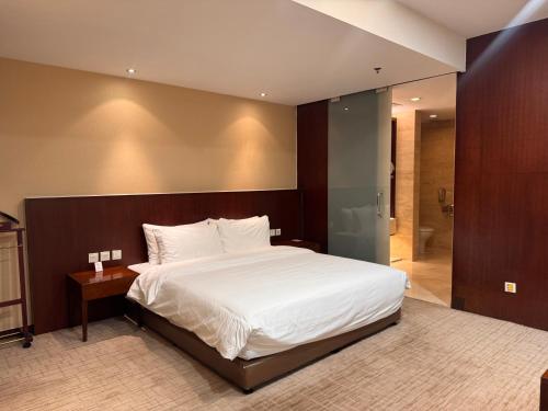 Deluxe room del hotel Mercure Wanshang Beijing. Foto 4