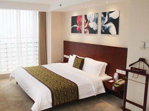 Suite del hotel Mercure Wanshang Beijing. Foto 1