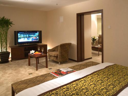 Suite del hotel Mercure Wanshang Beijing. Foto 3