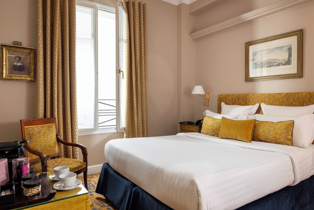 Habitación Confort (dos camas individuales bajo petición antes de la llegada) del hotel Relais Madeleine. Foto 1