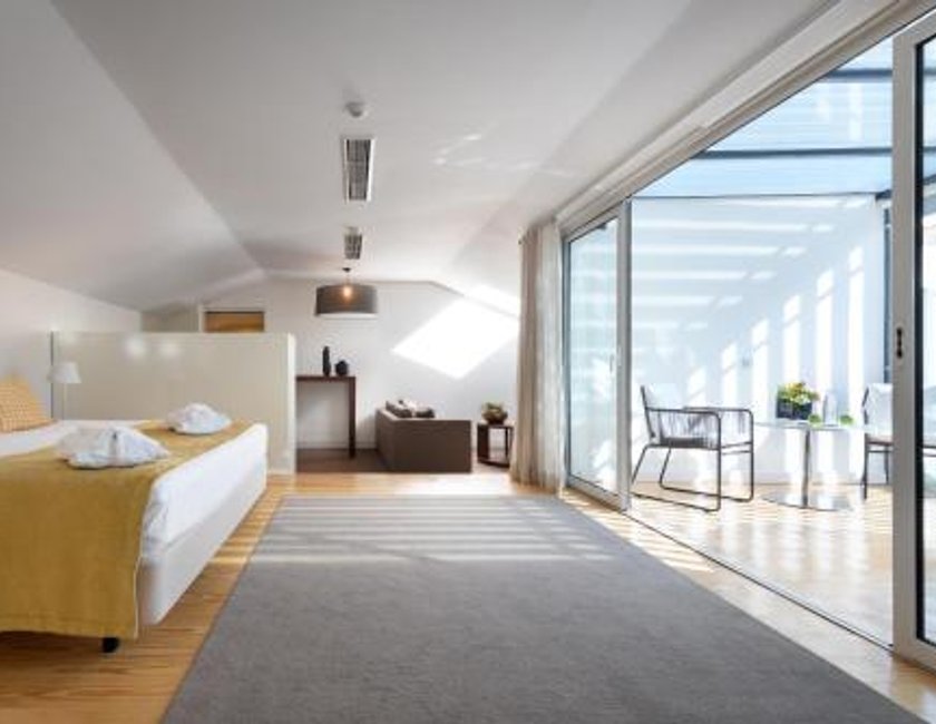 Suite Deluxe con bañera de hidromasaje del hotel Inspira Liberdade Boutique. Foto 3