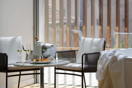 Suite Deluxe con bañera de hidromasaje del hotel Inspira Liberdade Boutique. Foto 5