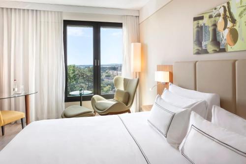 Habitación Level con vistas a la ciudad y acceso al salón executive del hotel Melia Luxembourg
