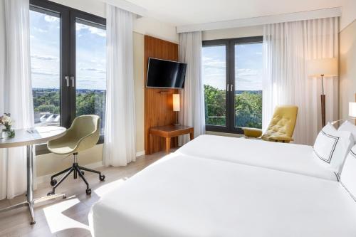 Suite Grand The Level con acceso al salón executive del hotel Melia Luxembourg. Foto 1