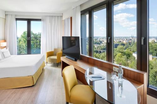 Habitación Premium The Level con vistas a la ciudad y acceso al salón executive del hotel Melia Luxembourg. Foto 5
