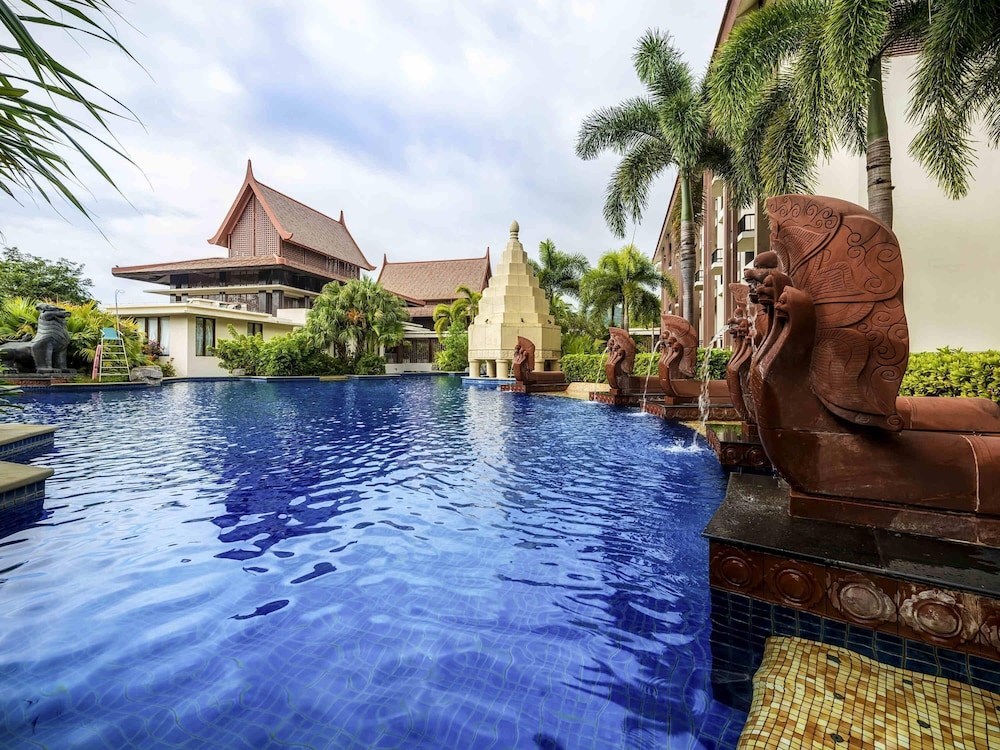 Habitación Familiar de Dos Dormitorios, una Cama King y dos camas individuales, Vistas a la Piscina del hotel Pullman Sanya Yalong Bay Villas and Resort. Foto 4