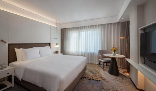 Habitación Superior con cama extragrande del hotel Sunworld Dynasty Hotel Beijing