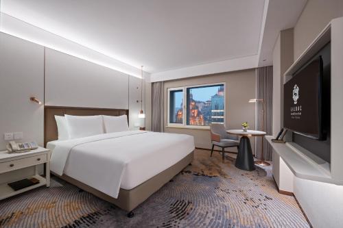 Habitación Deluxe con cama extragrande del hotel Sunworld Dynasty Hotel Beijing