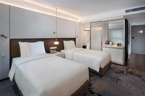 Habitación Superior - 2 camas del hotel Sunworld Dynasty Hotel Beijing