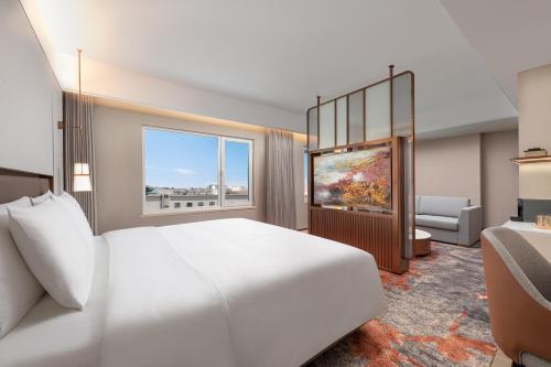 Suite Business del hotel Sunworld Dynasty Hotel Beijing. Foto 3