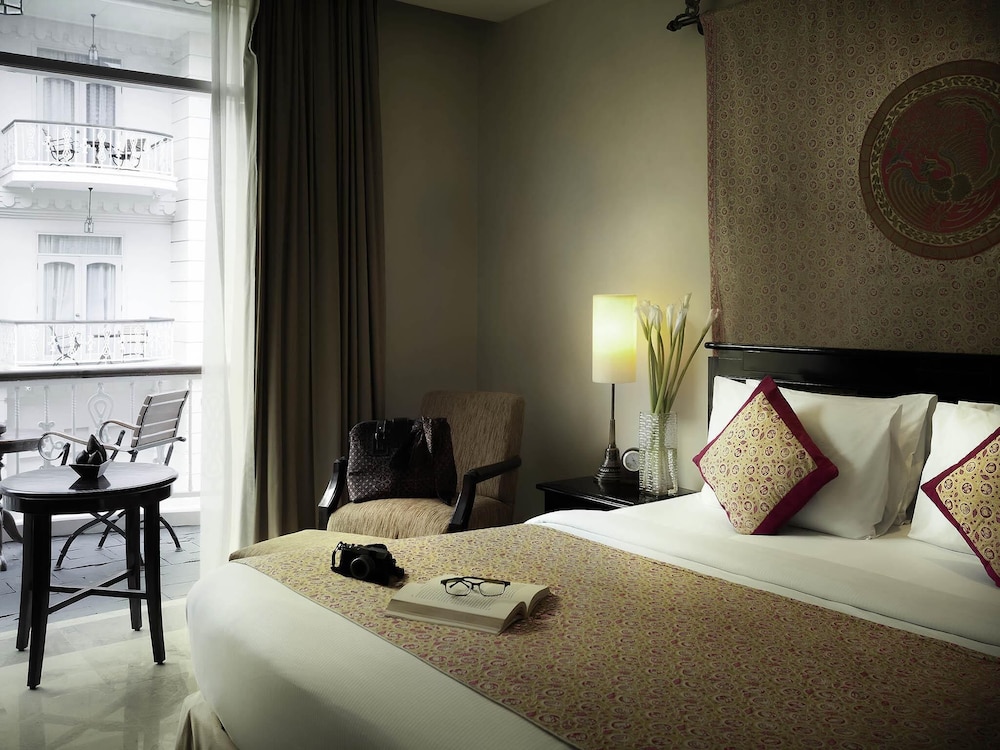 Phoenix Executive, cama king size del hotel The Phoenix Hotel Yogyakarta - Handwritten Collection. Foto 8