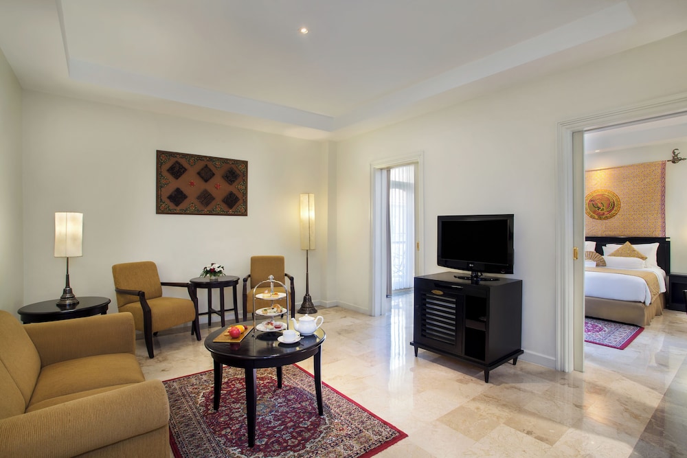 Suite Legendary, cama king size del hotel The Phoenix Hotel Yogyakarta - Handwritten Collection. Foto 2