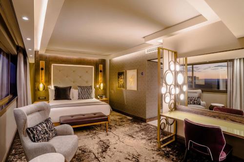 Sandton Towers Corner Deluxe King Room del hotel Sandton Sun and Towers. Foto 1