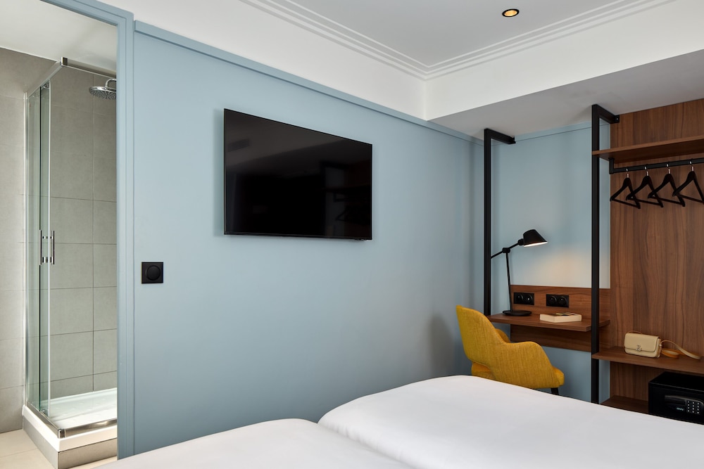 Habitación Confort con 2 camas individuales del hotel Timhotel Paris Gare Du Nord. Foto 1