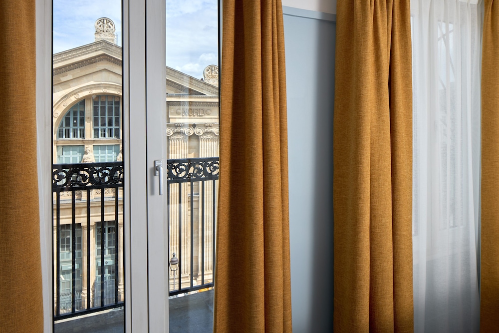 Habitación doble superior del hotel Timhotel Paris Gare Du Nord. Foto 1
