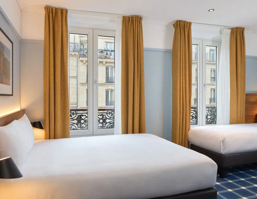 Habitación Triple del hotel Timhotel Paris Gare Du Nord. Foto 2
