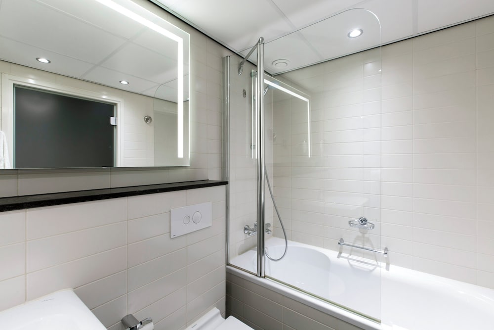 Suite, 1 cama de matrimonio grande con sofá cama del hotel Holiday Inn Eindhoven Centre, An Ihg