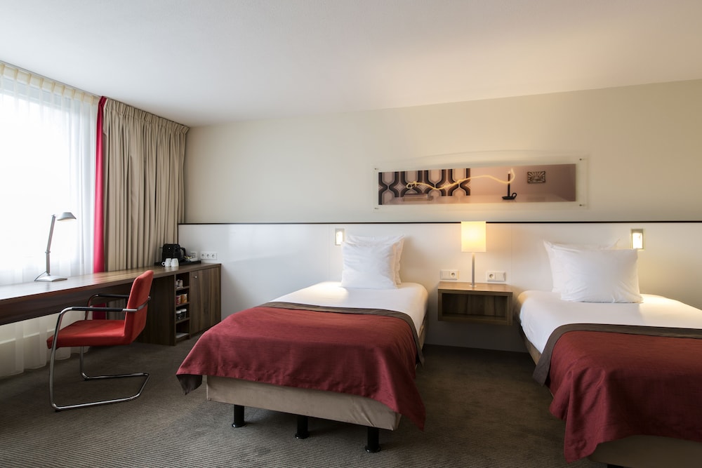 Suite, varias camas del hotel Holiday Inn Eindhoven Centre, An Ihg. Foto 1
