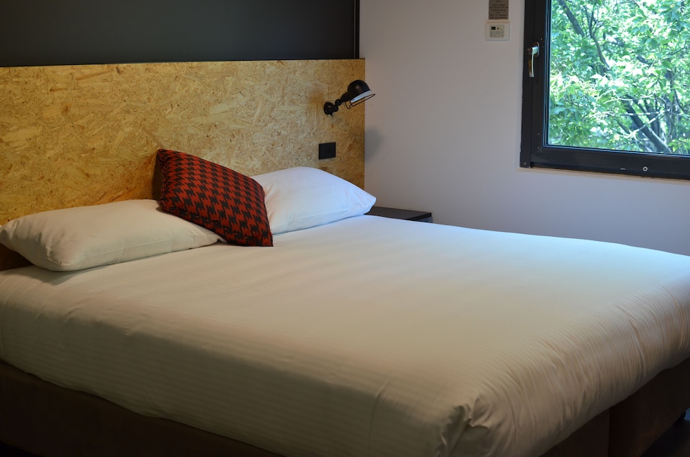 Habitación Estándar con 1 Cama Queen del hotel Ibis Budget Sydney East. Foto 2