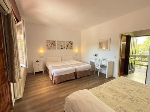 Habitación Triple del hotel Los Olivos. Foto 11