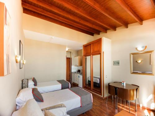 Apartamento de 1 dormitorio con 1 cama doble o 2 camas individuales y vistas del hotel OYO Miami Santa Catalina. Foto 5