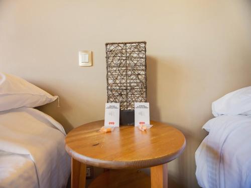 Apartamento de 1 dormitorio con 1 cama doble o 2 camas individuales y vistas del hotel OYO Miami Santa Catalina. Foto 7