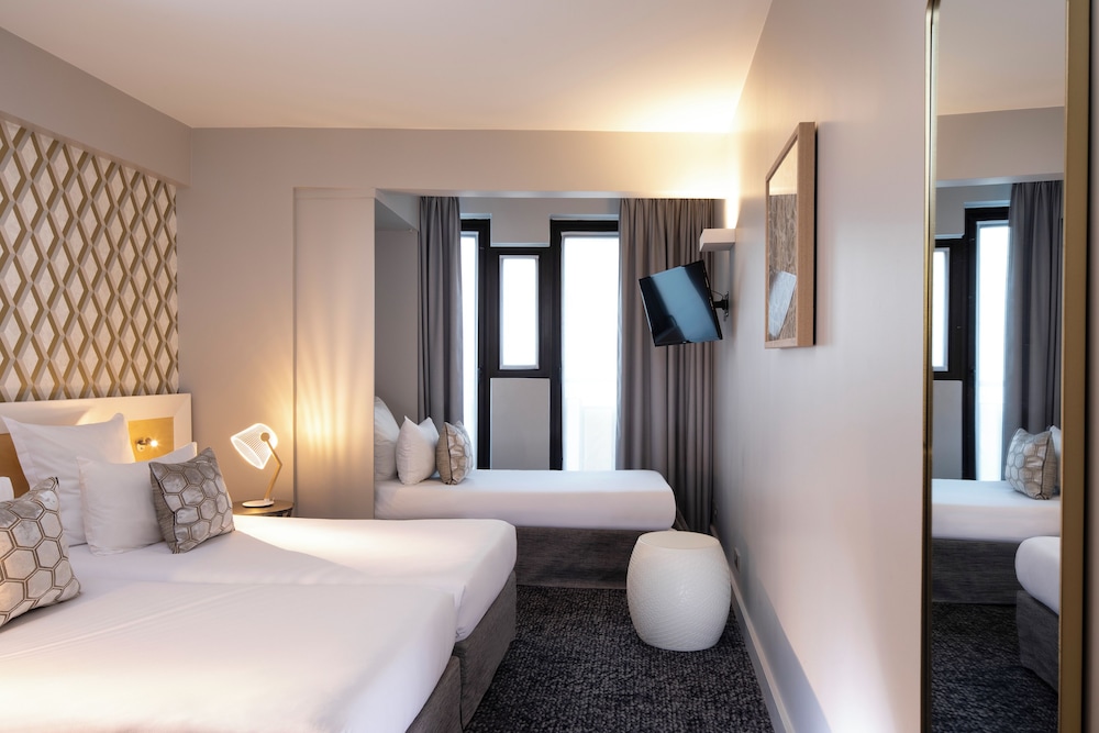 Habitación triple (Sin limpieza - SALVA EL PLANETA) del hotel Paris Bastille
