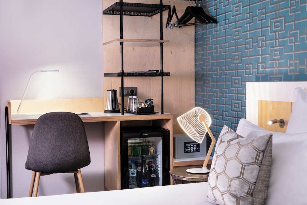 Habitación triple (Sin limpieza - SALVA EL PLANETA) del hotel Paris Bastille. Foto 1