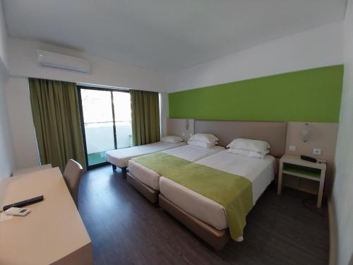 Twin Comfort with Extra bed del hotel Navegadores. Foto 6
