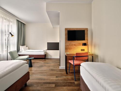 Habitación Familiar Premium del hotel Garner Hotel Berlin - Schöneberg, an IHG. Foto 3