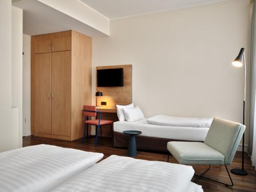 Habitación doble 1 Cama queen 1 Cama Individual del hotel Garner Hotel Berlin - Schöneberg, an IHG. Foto 1