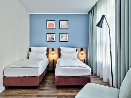 Premium Room with Three Single Beds - Up to Three Adults del hotel Garner Hotel Berlin - Schöneberg, an IHG