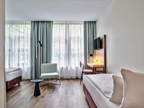 Premium Room with Three Single Beds - Up to Three Adults del hotel Garner Hotel Berlin - Schöneberg, an IHG. Foto 6