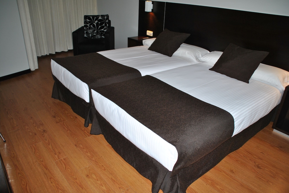 Habitación con 1 cama doble o 2 individuales del hotel Junquera