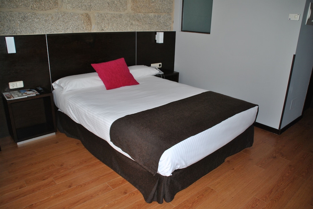 Habitación con 1 cama doble o 2 individuales del hotel Junquera. Foto 2