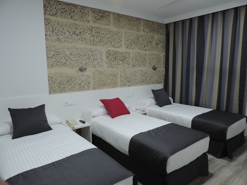 Habitación Triple Económica del hotel Junquera