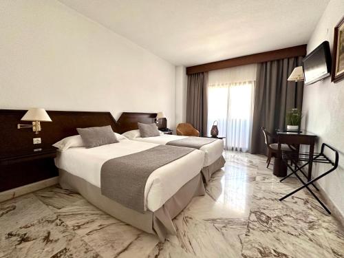 Habitación Doble - 2 camas del hotel Turia. Foto 1