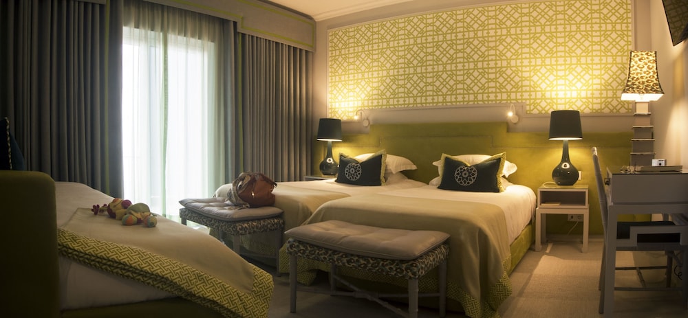 Habitación Triple del hotel Coração De Fátima Boutique. Foto 1