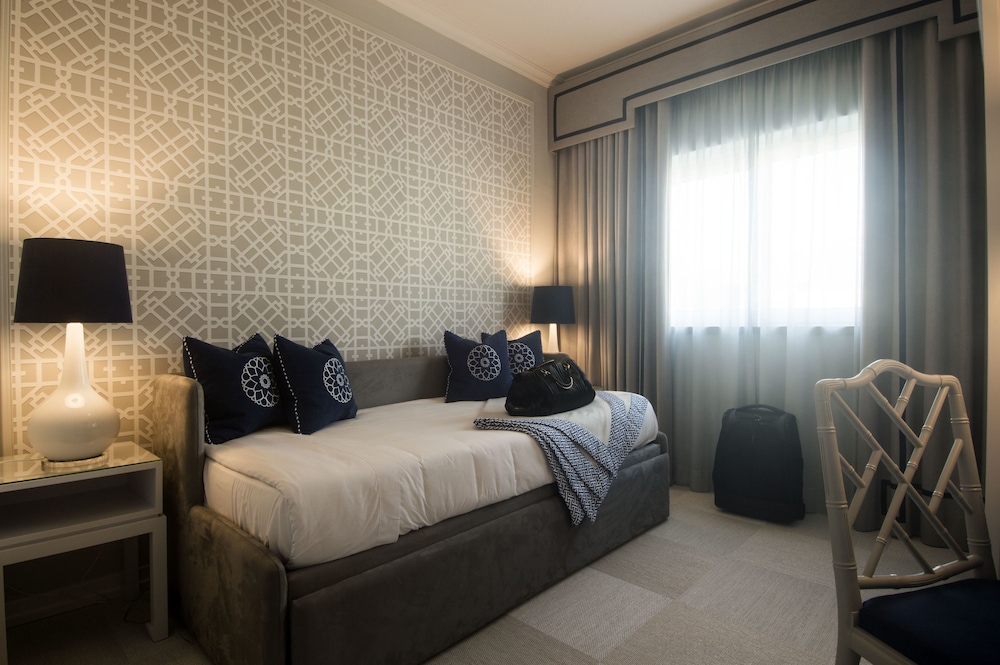 Habitación Triple del hotel Coração De Fátima Boutique. Foto 2