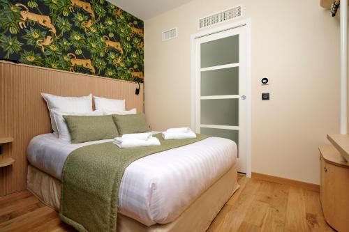 Habitación Doble Estándar del hotel VLH Montparnasse Eiffel. Foto 3