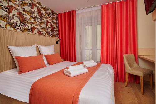 Habitación Doble Estándar del hotel VLH Montparnasse Eiffel. Foto 4