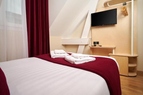 Habitación Doble Estándar del hotel VLH Montparnasse Eiffel. Foto 8