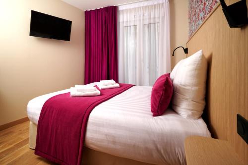Habitación Doble Estándar del hotel VLH Montparnasse Eiffel. Foto 10